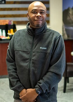 Staff member Samuel Johnson from ID_f127791825d4