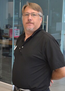 Staff member John Burton from ID_be9abf4b765c