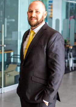 Staff member Caleb Ashley from ID_1a29b3179f0d