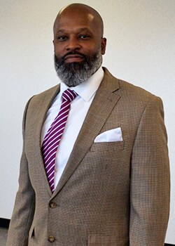 Staff member Neil Springer from ID_50044298debe