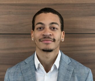 Staff member Caleb Granderson from c7b4ef1fb05c