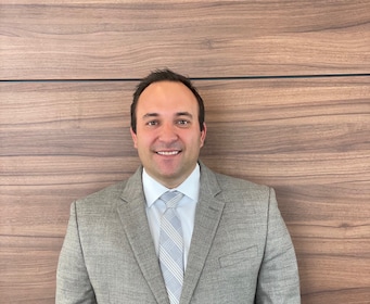 Staff member Joe Cortese from 7b8e0d978bd1