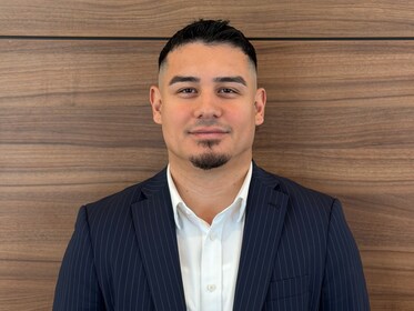 Staff member Alan Ramirez from 7b8e0d978bd1