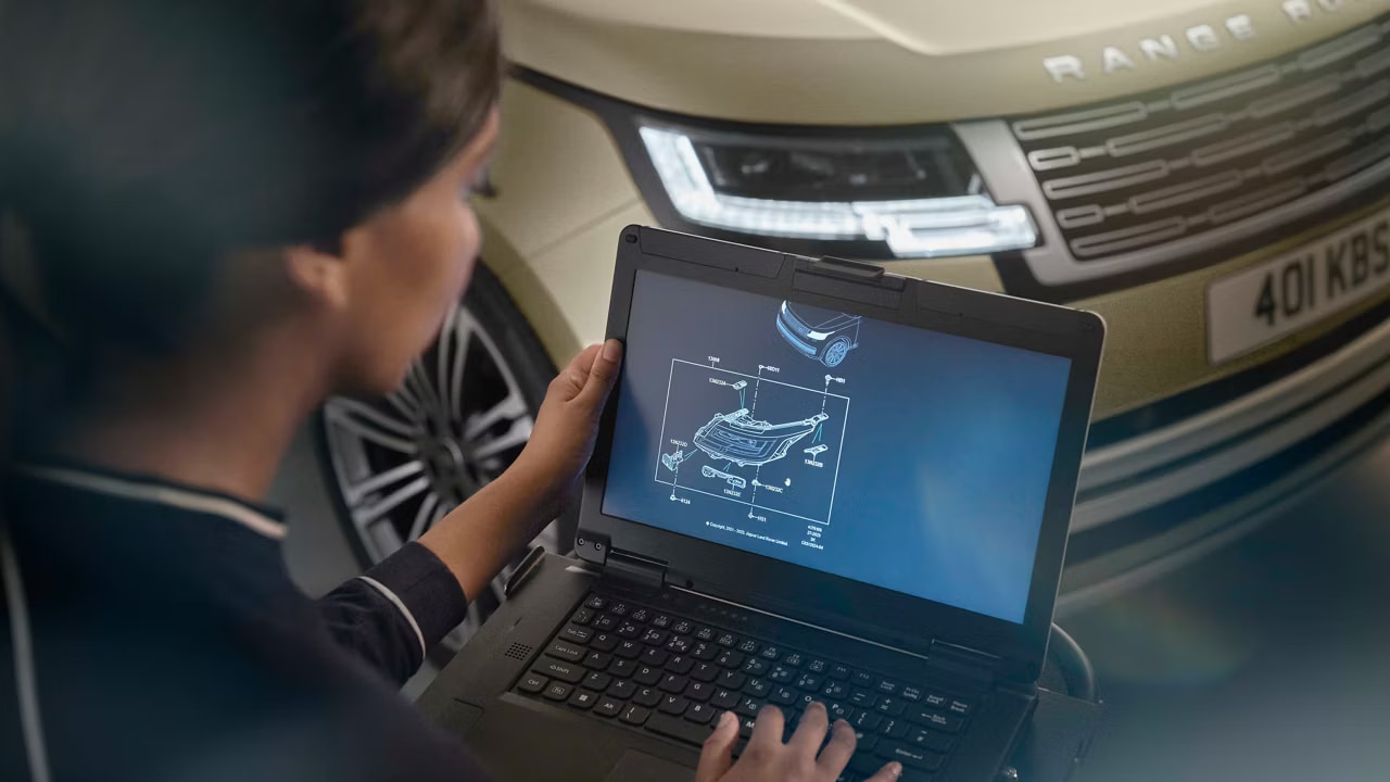 Land Rover service technician using diagnostic software