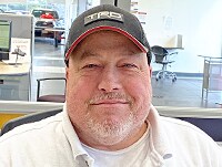 Staff member Eugene Desroches from ID_1a301e11a67d