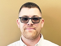 Staff member James Smith from ID_322c7bd9a73f