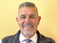 Staff member Lou Carvalho from 13c9e92fadb2