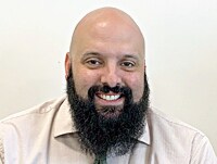 Staff member Ken Natanel from f7951365afd4