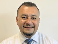 Staff member Milton Sican from 4c2a12fcb64a