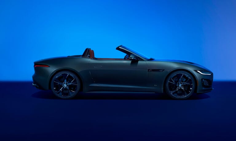 2024 Jaguar F-TYPE convertible side view in blue room