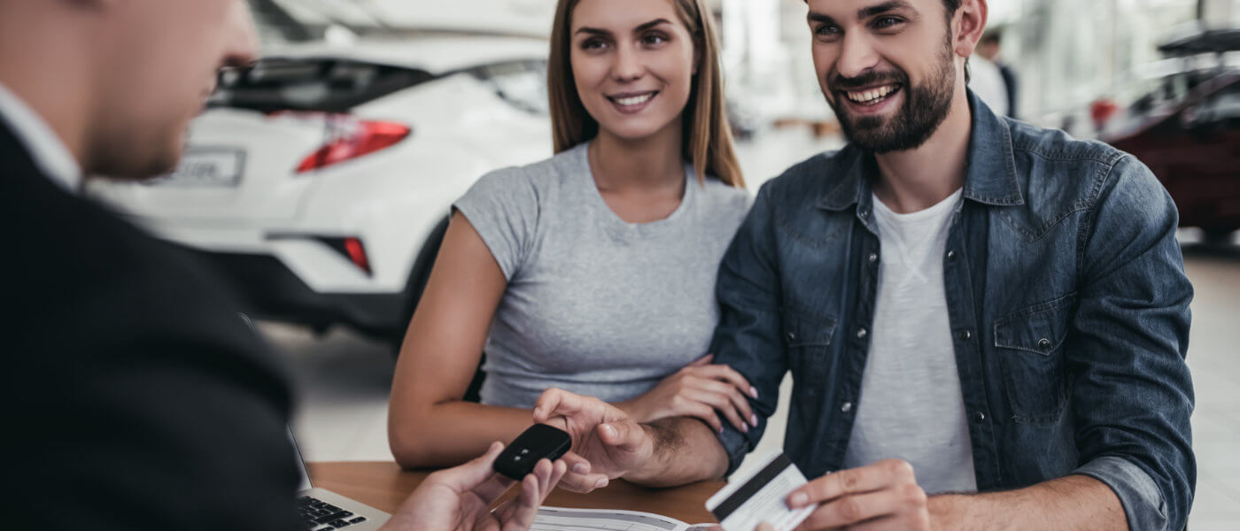 Couple accepting keys