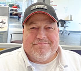 Staff member Eugene Desroches from ID_6d19e120f3e8