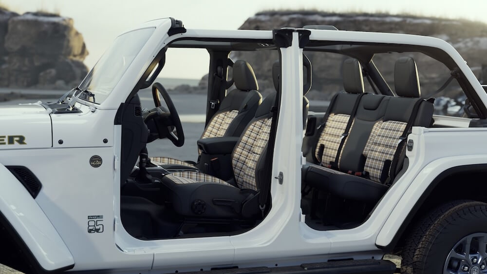 2026 Jeep Wrangler 85th Anniversary Edition with removable doors showcasing the exclusive plaid interior