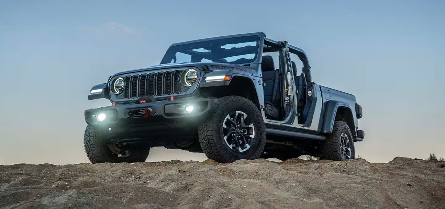 2026 Jeep Gladiator Rubicon parked on rocky terrain