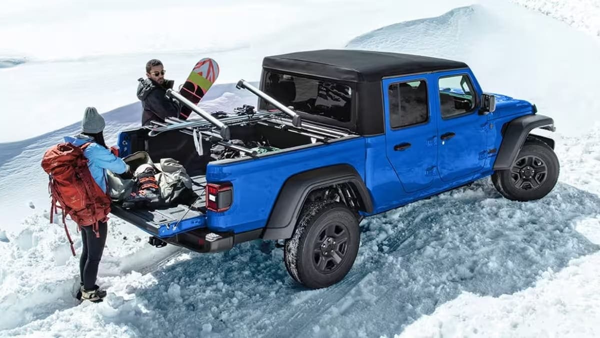 Jeep Gladiator driving on a snow-covered road
