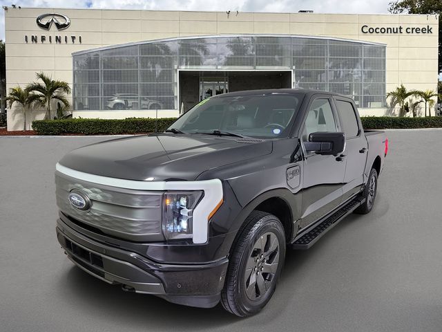 Used 2023 Ford F-150 Lightning Lariat with VIN 1FTVW1EL2PWG18845 for sale in Naples, FL