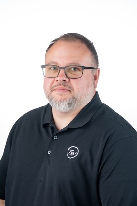 Staff member Brandon Brown from 6135d2ed96e9
