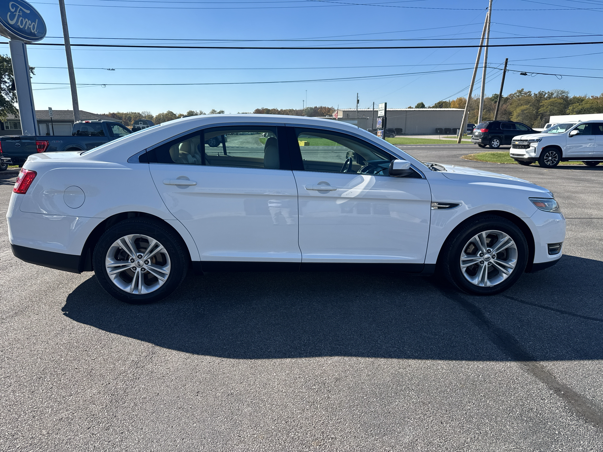 Used 2014 Ford Taurus SEL with VIN 1FAHP2E83EG135096 for sale in Paulding, OH