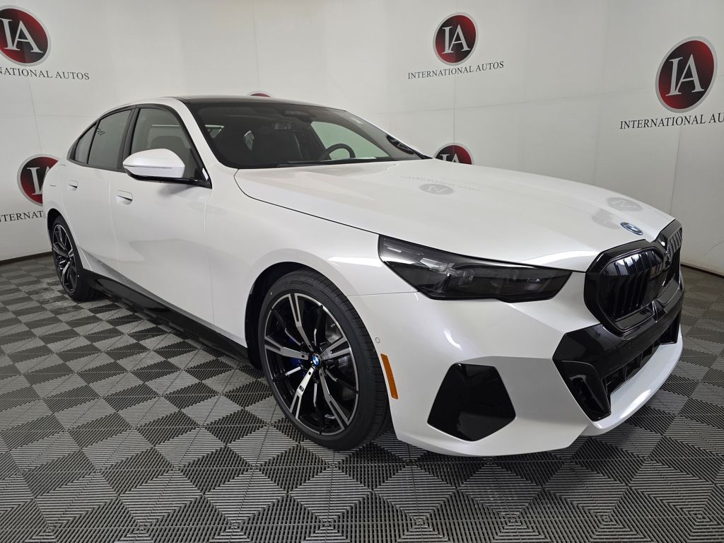 2027 BMW 5 Series 550e xDrive Sedan's photo