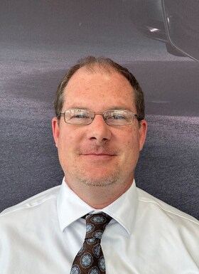 Staff member John Hayes from 6d78c6a84afb