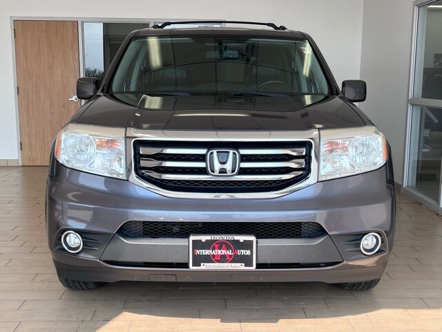 Used 2014 Honda Pilot EX-L with VIN 5FNYF4H54EB033861 for sale in Sheboygan, WI