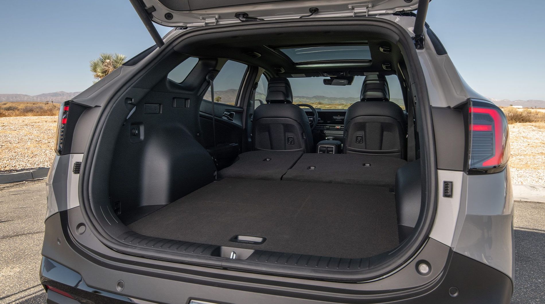 Área de carga del Kia Sportage con los respaldos traseros abatidos