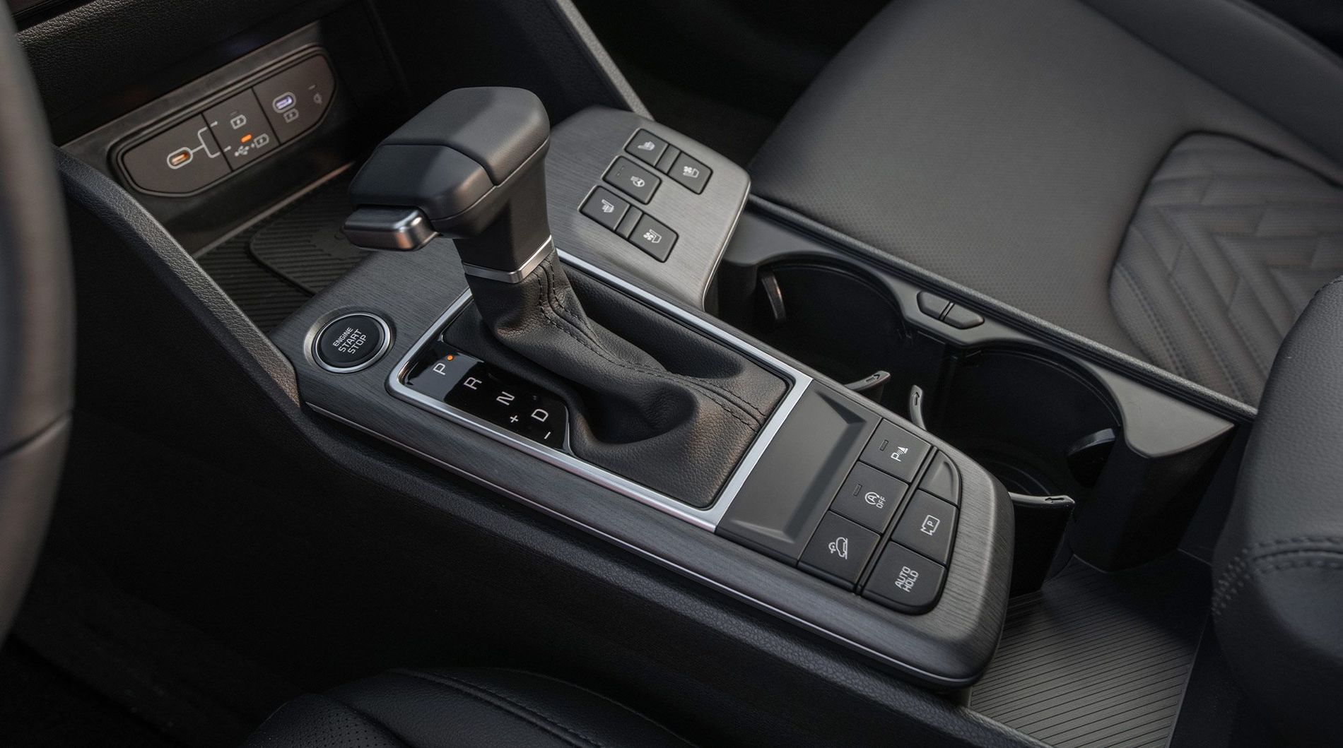 Selector de cambios y controles de la consola central del Kia Sportage