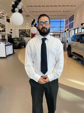 Staff member Karlos Karas from 96d8ca1a743c