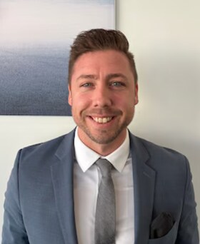 Staff member Josh Szentes from ad9cc08ab4ae