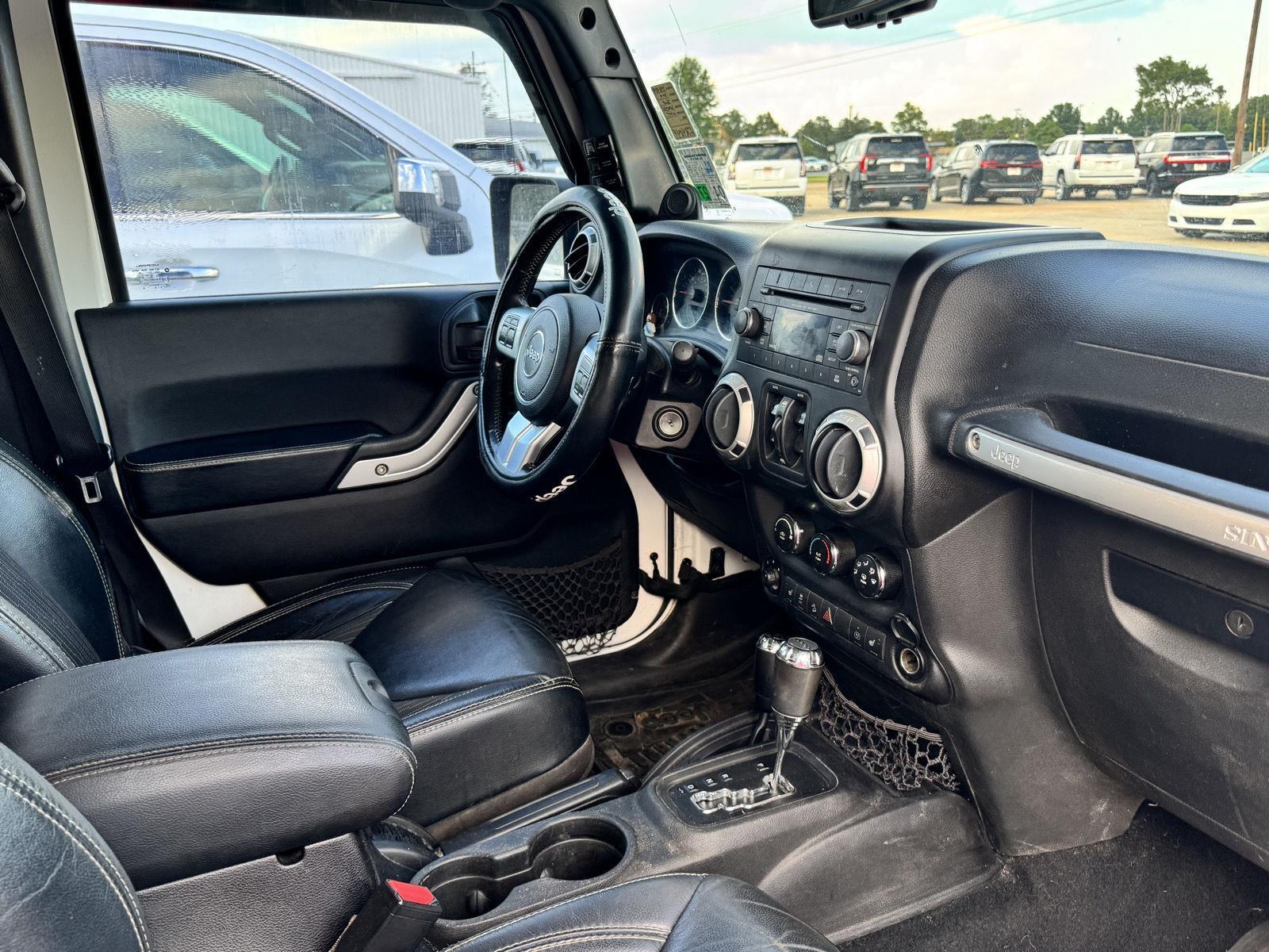 2014 Jeep Wrangler Unlimited Freedom Sport photo 2