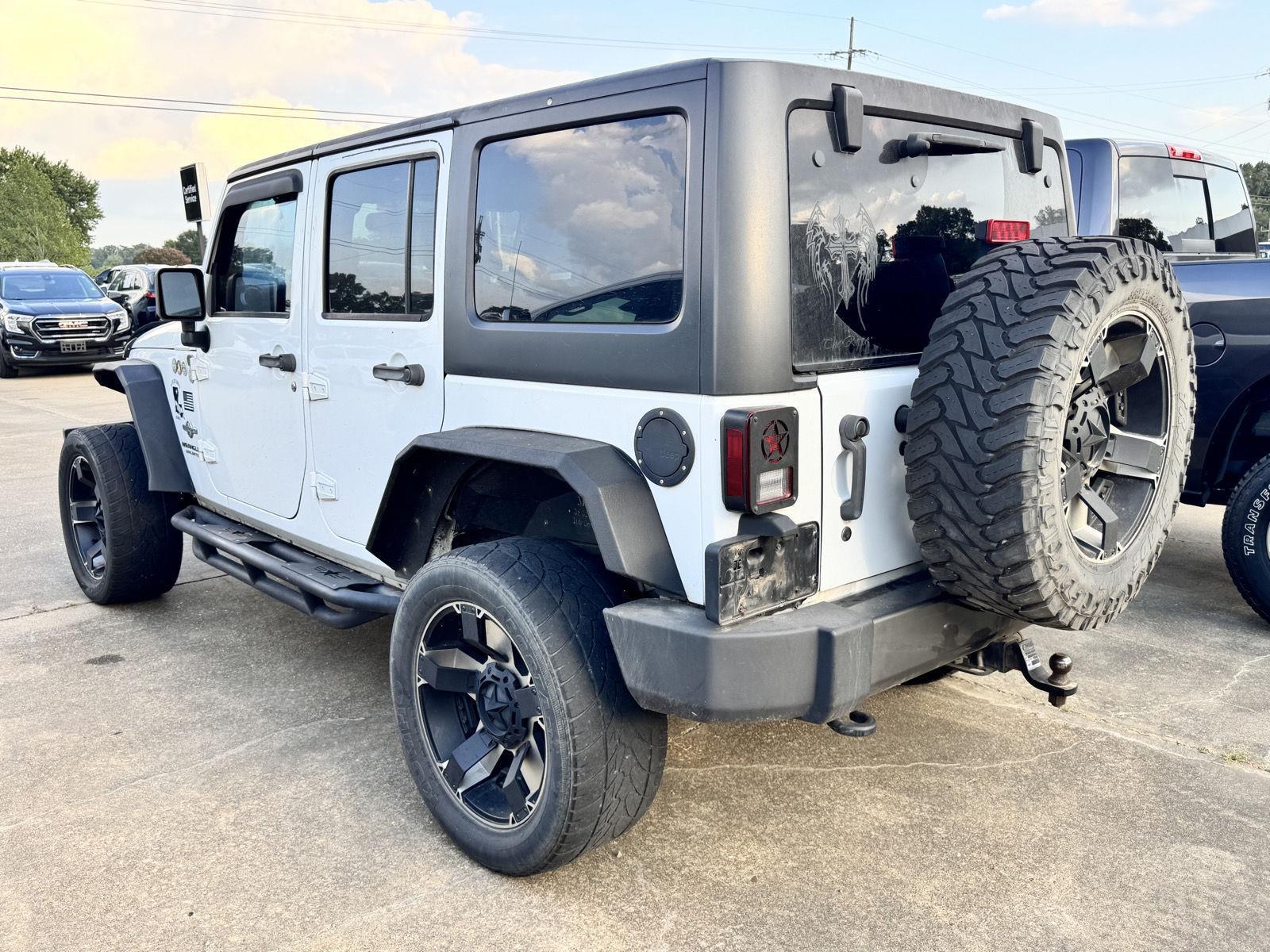 2014 Jeep Wrangler Unlimited Freedom Sport photo 3