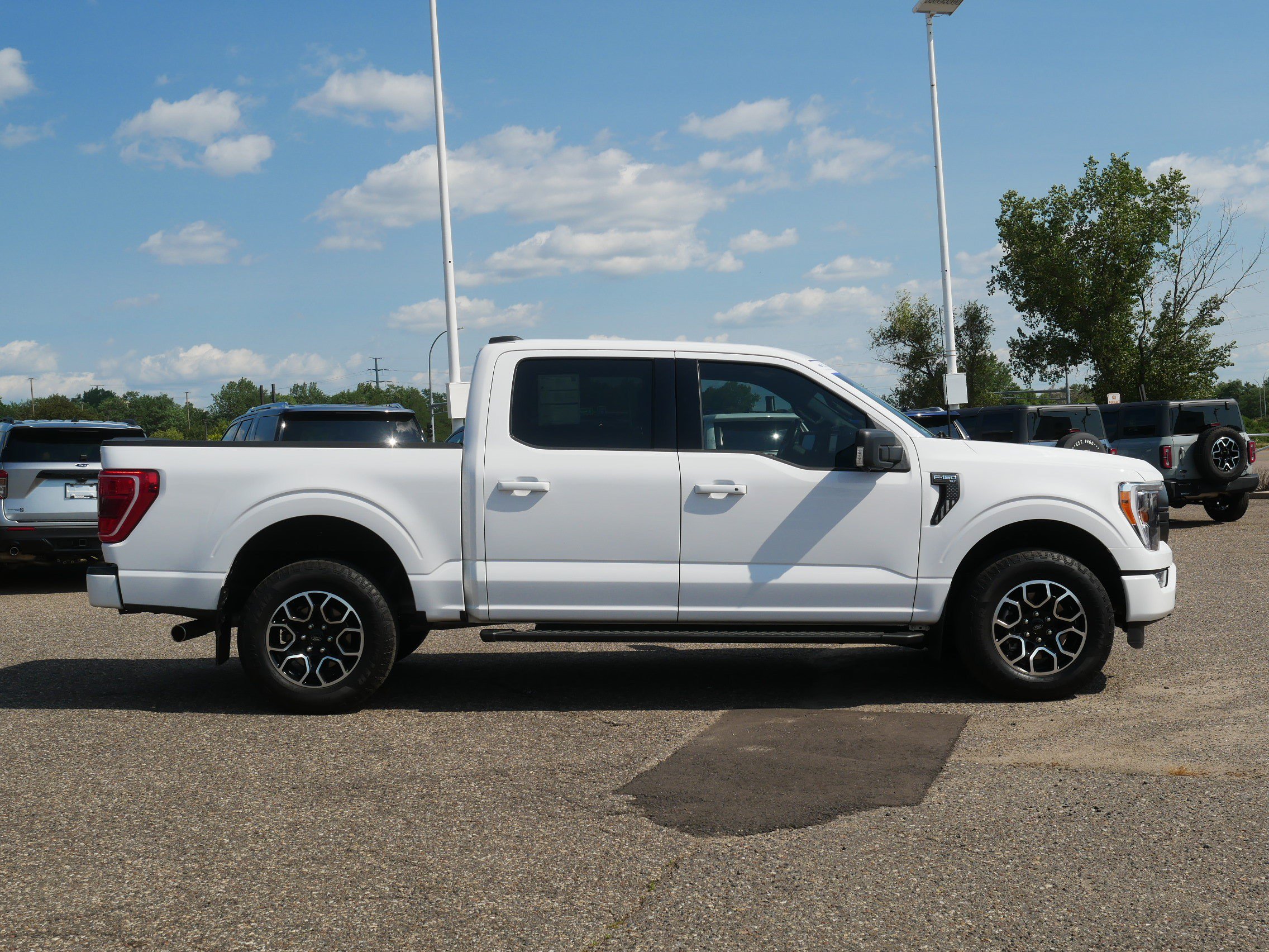 Used 2022 Ford F-150 XLT with VIN 1FTFW1E82NKE97061 for sale in Inver Grove Heights, Minnesota