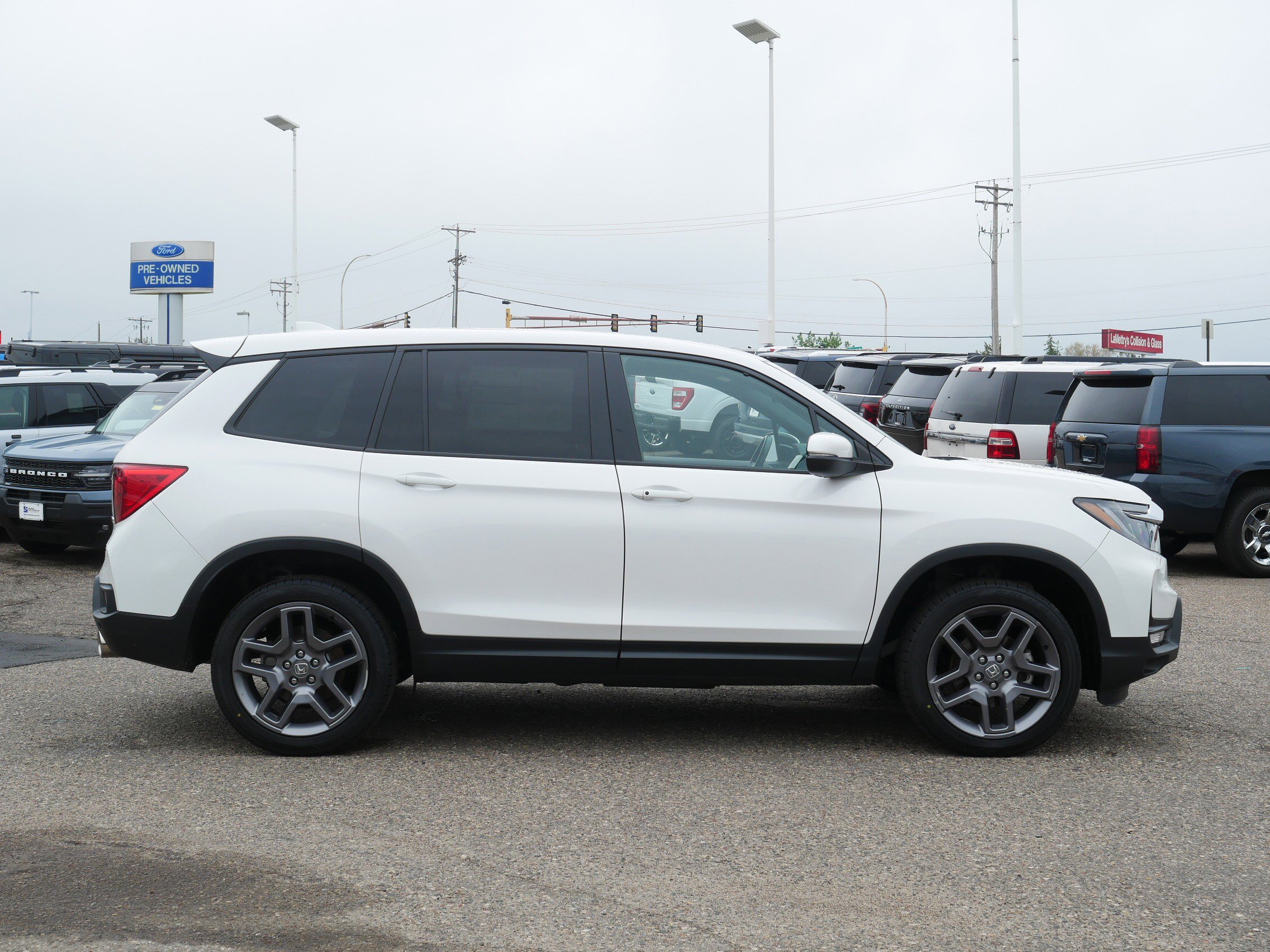 Used 2023 Honda Passport EX-L with VIN 5FNYF8H58PB038071 for sale in Inver Grove Heights, Minnesota