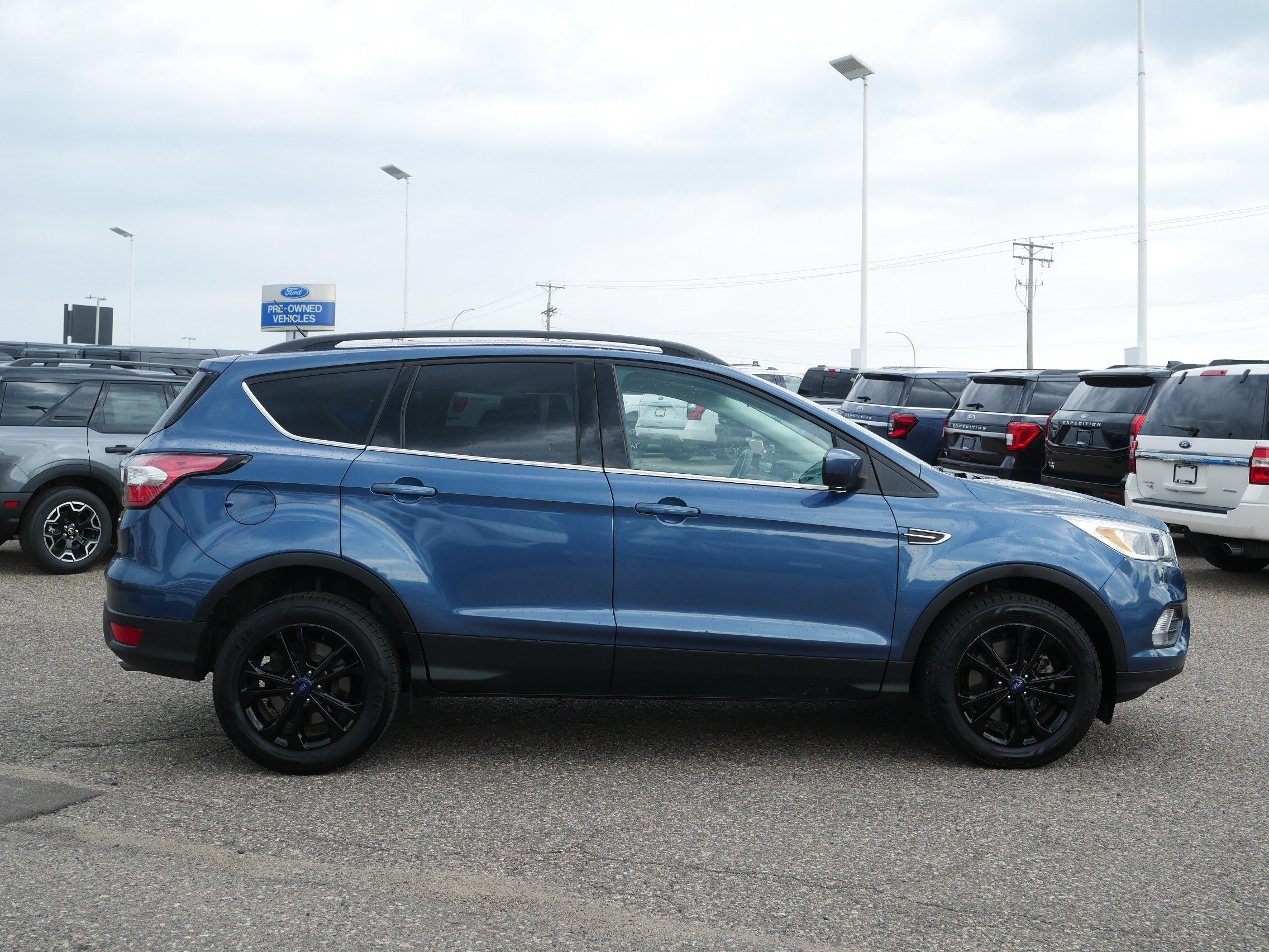 Used 2018 Ford Escape SE with VIN 1FMCU9GD4JUA99409 for sale in Inver Grove Heights, Minnesota