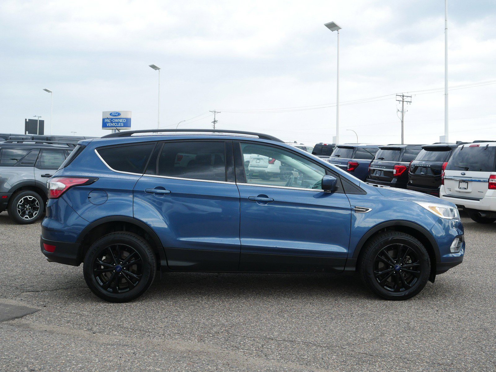Used 2018 Ford Escape SE with VIN 1FMCU9GD4JUA99409 for sale in Inver Grove Heights, Minnesota