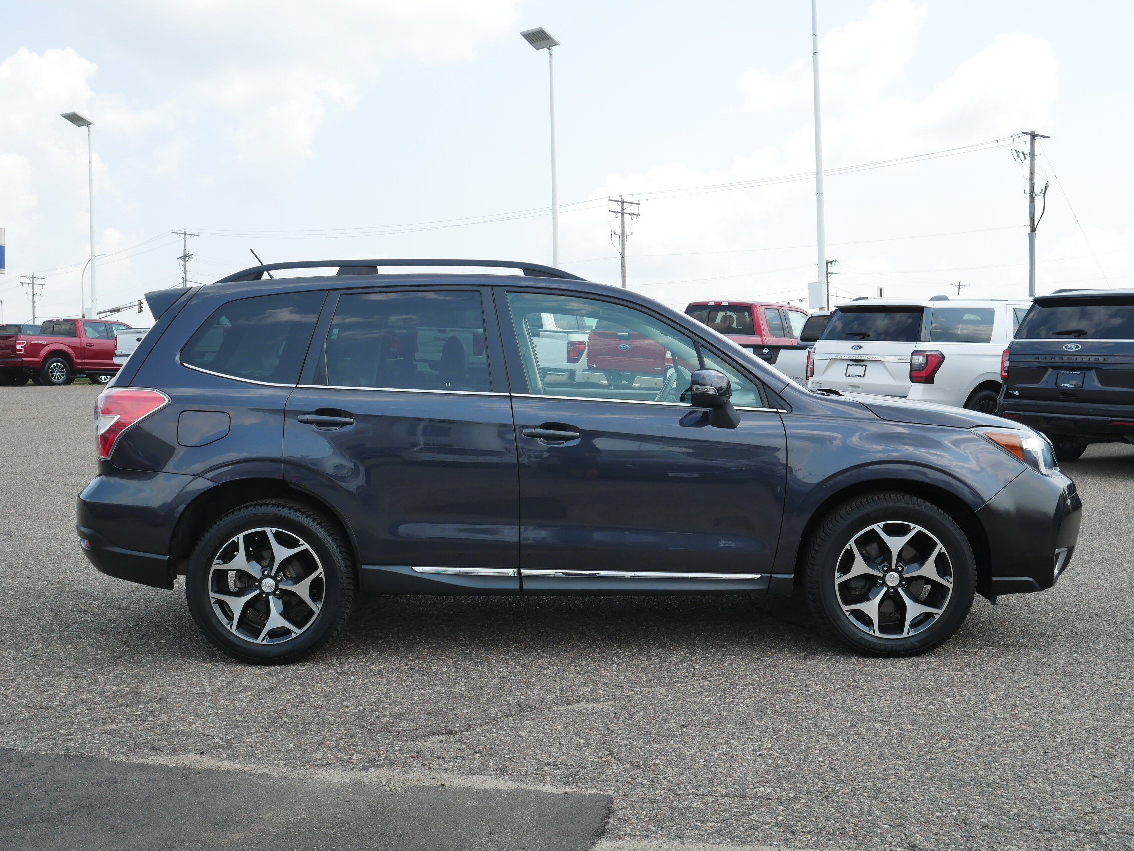 Used 2015 Subaru Forester XT Touring with VIN JF2SJGWC7FH524449 for sale in Inver Grove Heights, Minnesota