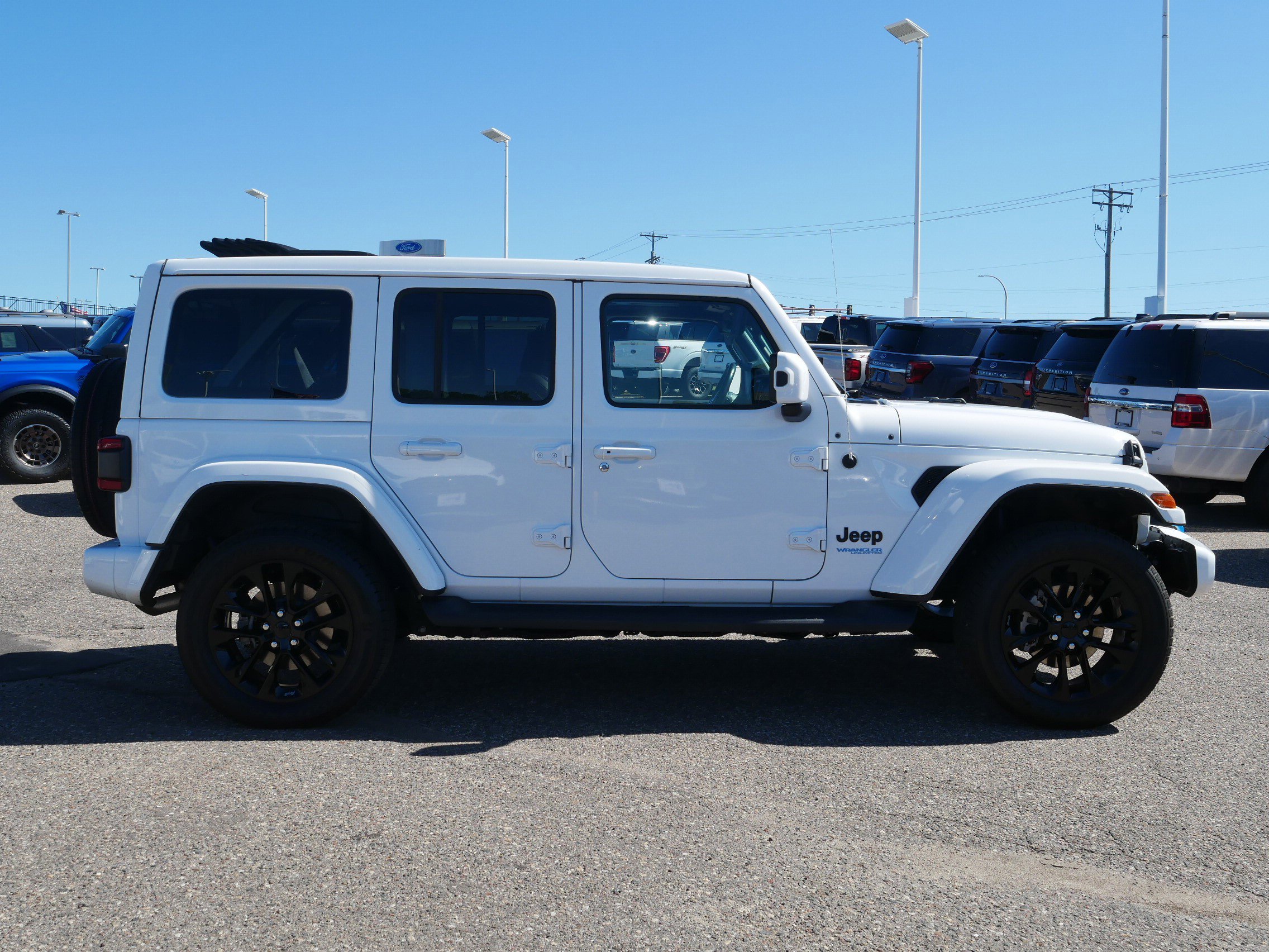 Used 2021 Jeep Wrangler Unlimited High Altitude 4XE with VIN 1C4JJXP61MW698433 for sale in Inver Grove Heights, Minnesota