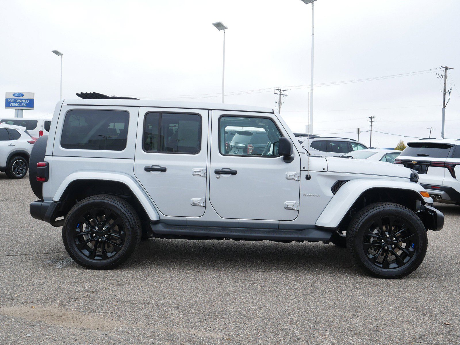 Certified 2023 Jeep Wrangler 4xe Sahara 4XE with VIN 1C4JJXP67PW604205 for sale in Inver Grove Heights, Minnesota