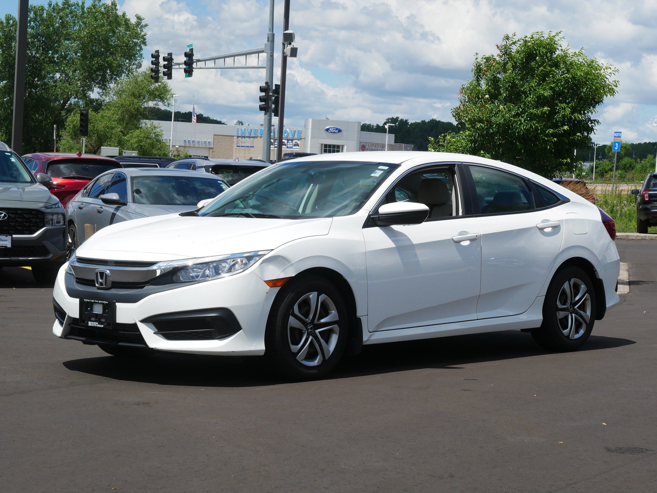 Used 2018 Honda Civic LX with VIN 2HGFC2F55JH512111 for sale in Oakdale, Minnesota