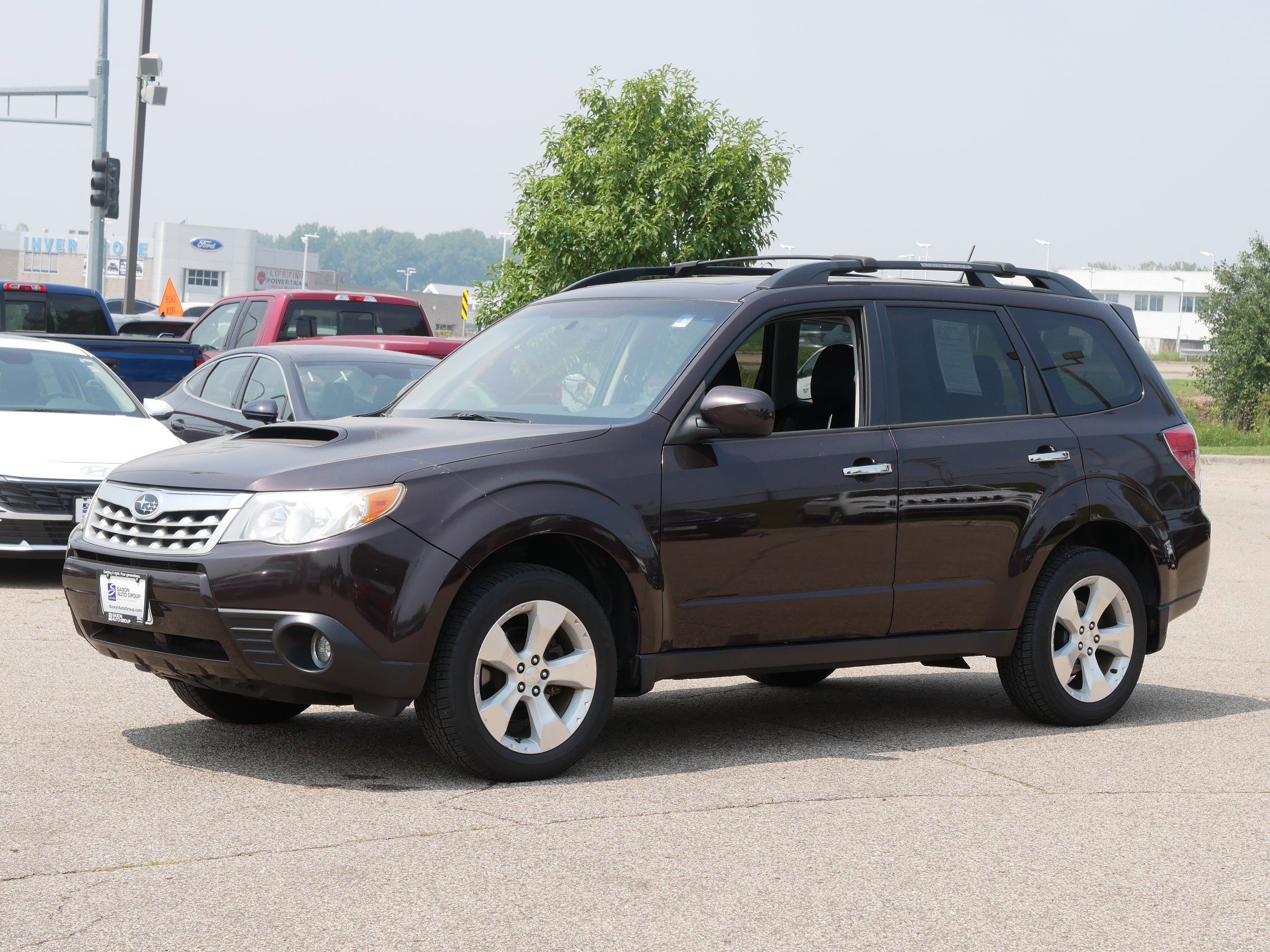 Used 2013 Subaru Forester XT Premium with VIN JF2SHGAC1DH407272 for sale in Inver Grove Heights, Minnesota