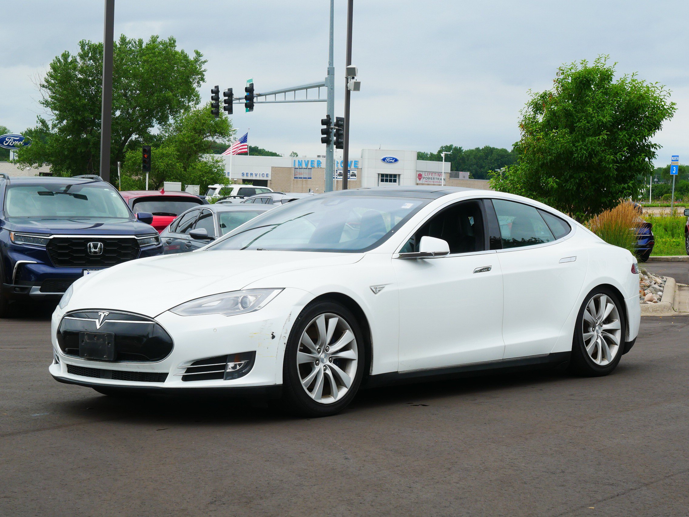 Used 2015 Tesla Model S S with VIN 5YJSA1E21FF102357 for sale in Inver Grove Heights, MN