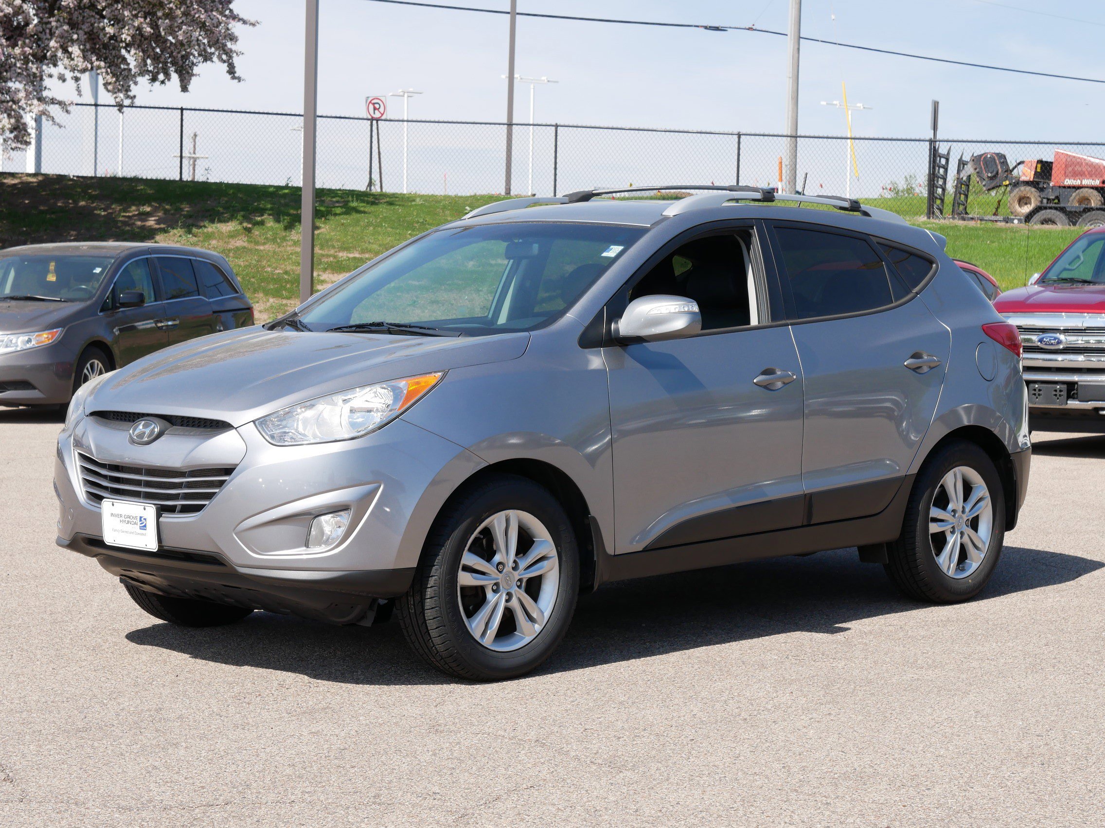 Used 2013 Hyundai Tucson GLS with VIN KM8JUCAC7DU689516 for sale in Inver Grove, Minnesota