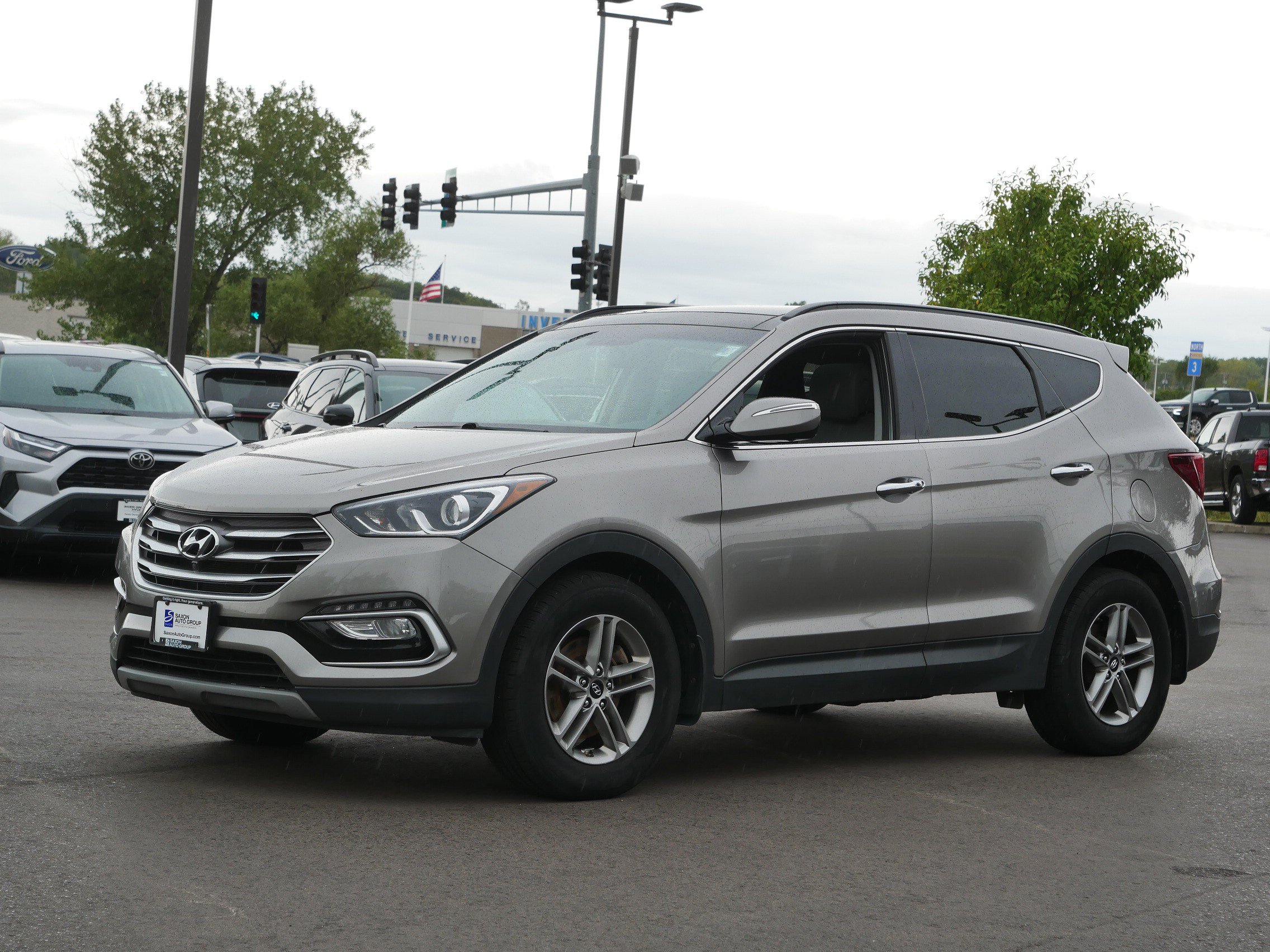 Used 2018 Hyundai Santa Fe Sport with VIN 5XYZUDLB5JG567591 for sale in Inver Grove Heights, Minnesota