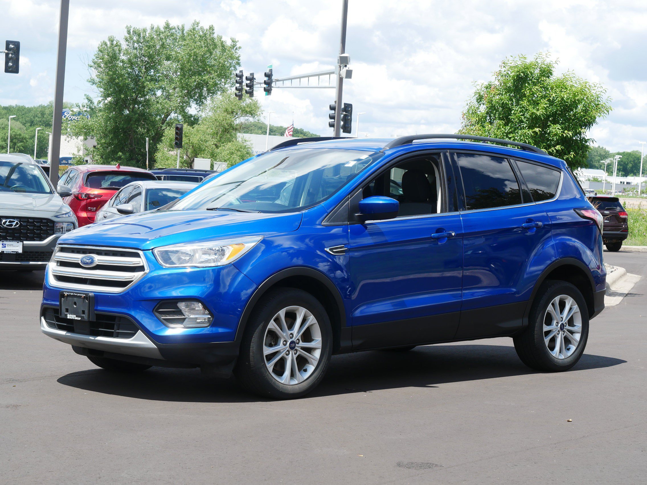Used 2018 Ford Escape SE with VIN 1FMCU9GD7JUD21456 for sale in Inver Grove Heights, Minnesota