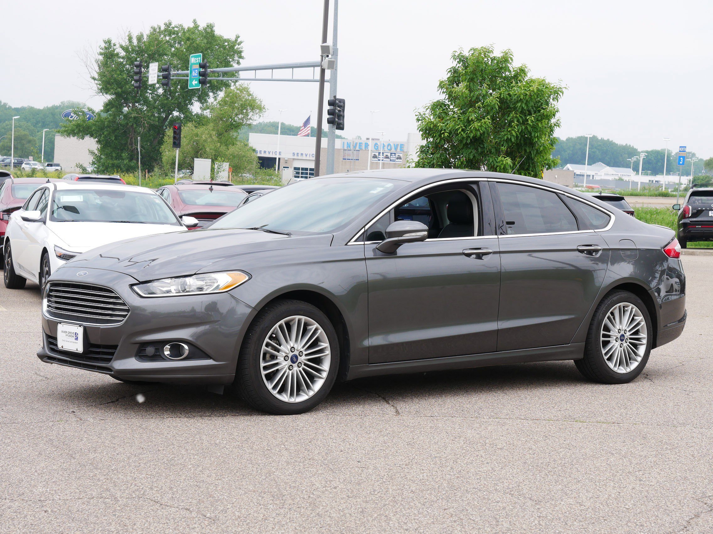 Used 2015 Ford Fusion SE with VIN 3FA6P0T90FR270781 for sale in Inver Grove, Minnesota