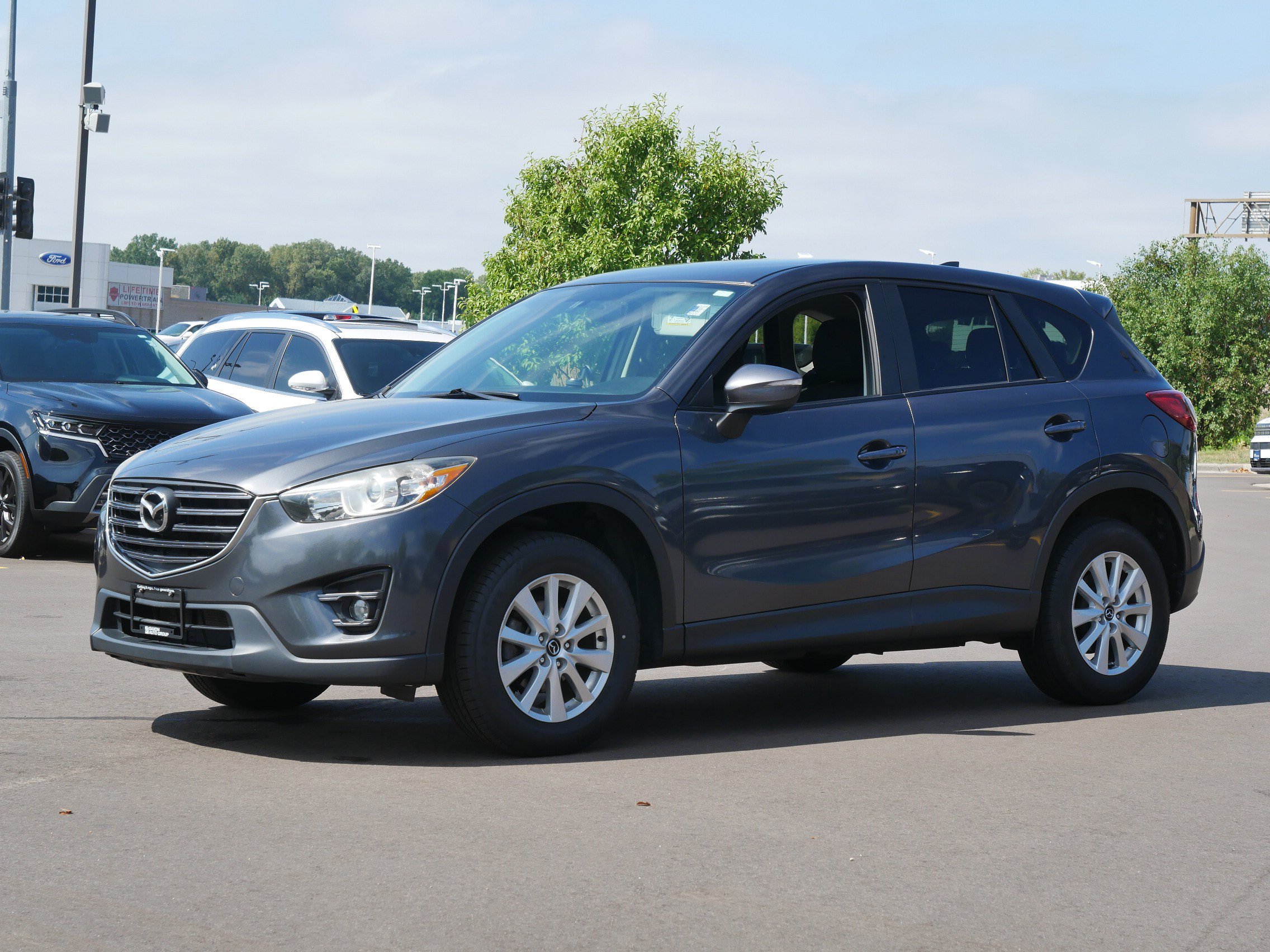 Used 2016 Mazda CX-5 Touring with VIN JM3KE4CY5G0718194 for sale in Inver Grove Heights, Minnesota