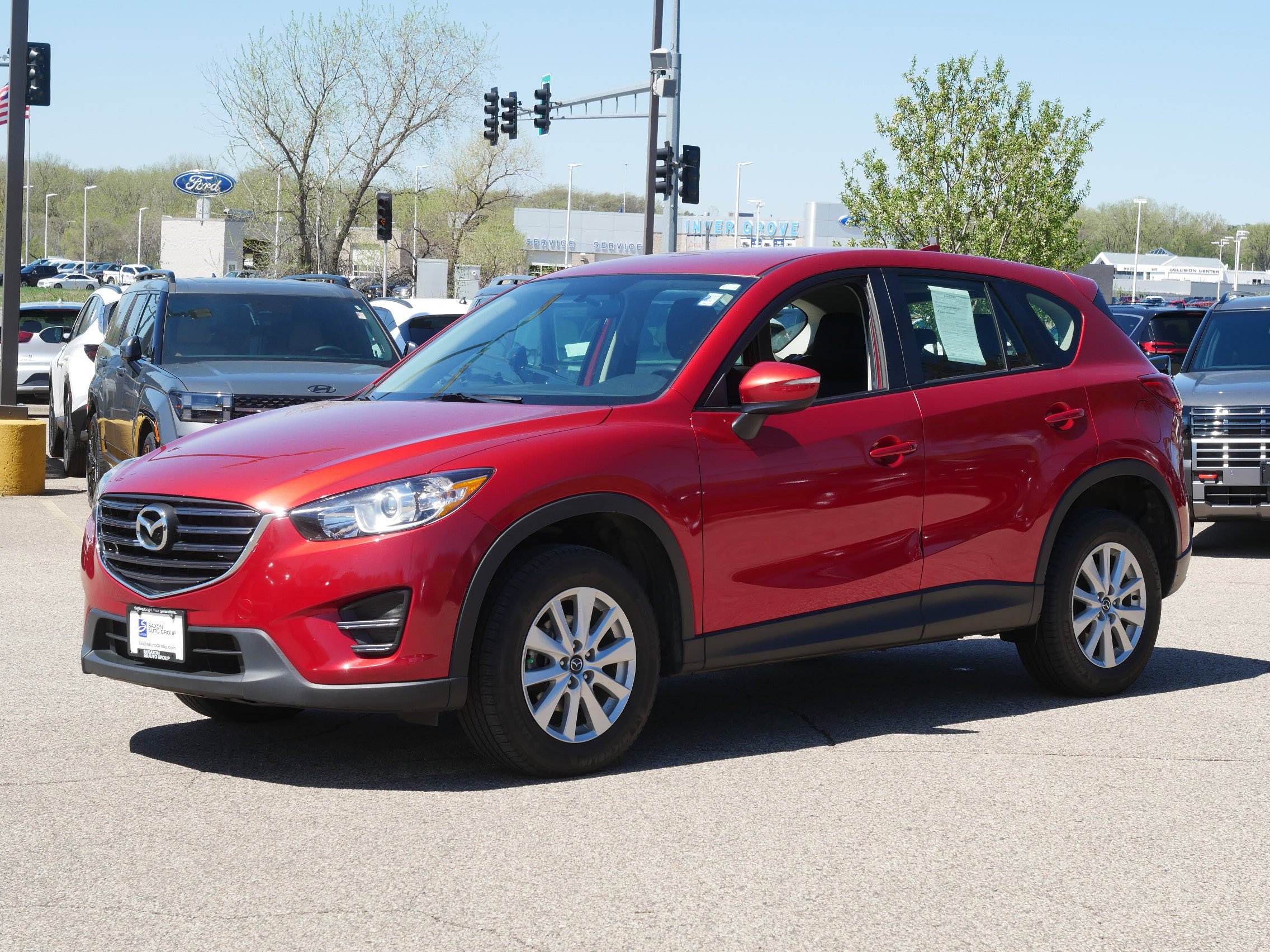 Used 2016 Mazda CX-5 Sport with VIN JM3KE4BY1G0757656 for sale in Inver Grove Heights, Minnesota