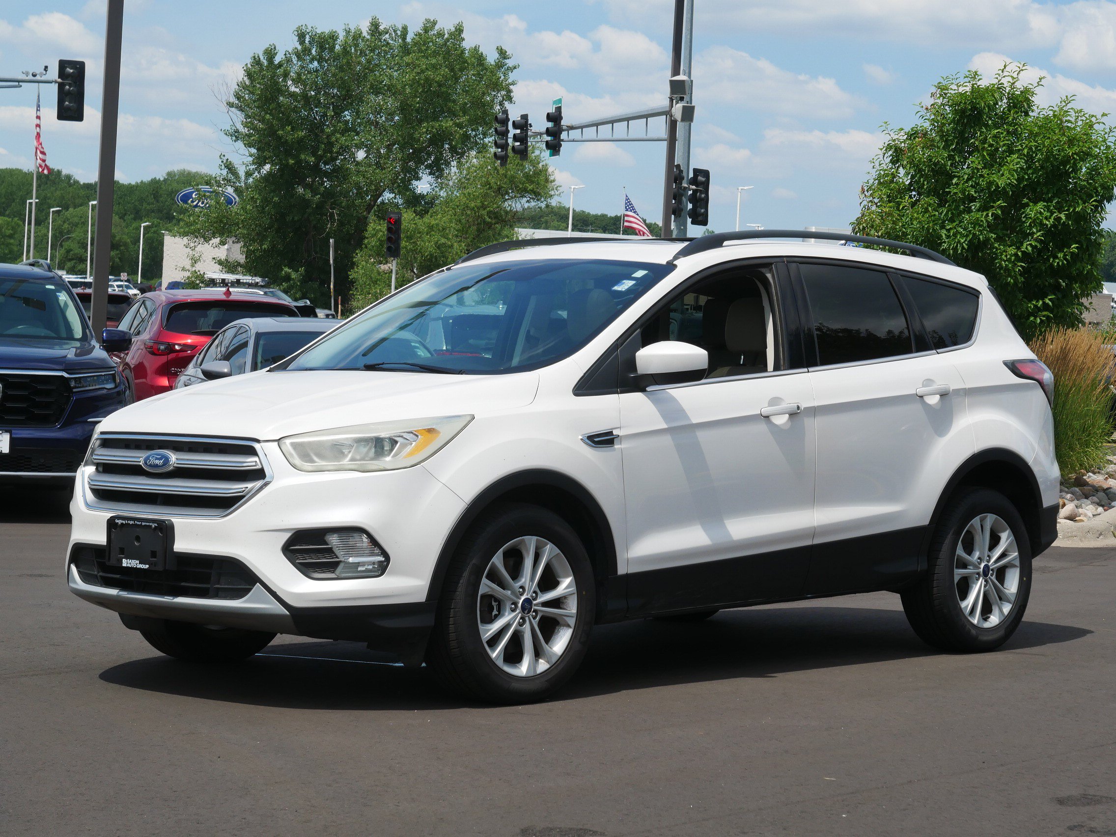 Used 2017 Ford Escape SE with VIN 1FMCU9G99HUA26056 for sale in Inver Grove Heights, Minnesota