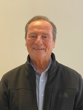 Staff member Joe from ID_828623