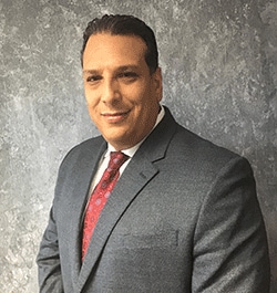 Staff member Emilio Rodriguez from ID_046a4e313b8b